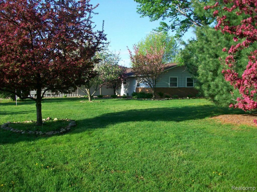 7305 Crofoot Road Fowlerville, MI 48836 - Photo 1 of 36 Beautiful flowering trees in spring