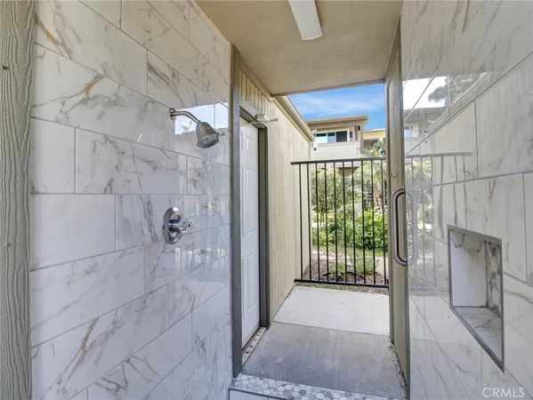 a view of a hallway with a glass door