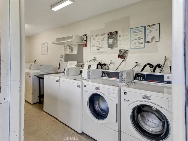 a view of kitchen sink and washer dryer