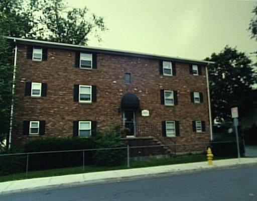 a brick building with a large windows