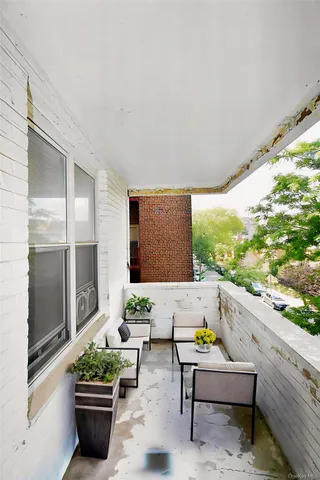 a outdoor living space with furniture and garden view