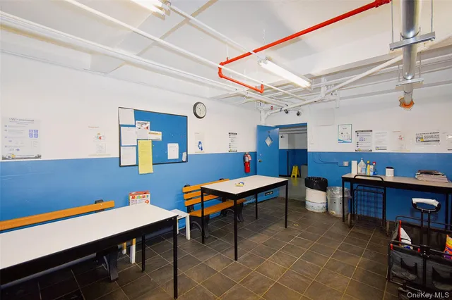 a room with furniture a rug and a table