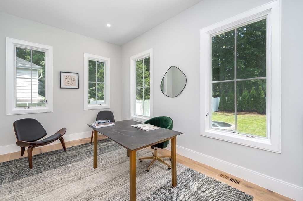 142 Bellingham Road Chestnut Hill, MA 02467 - Photo 13 of 37 a living room with furniture and a window