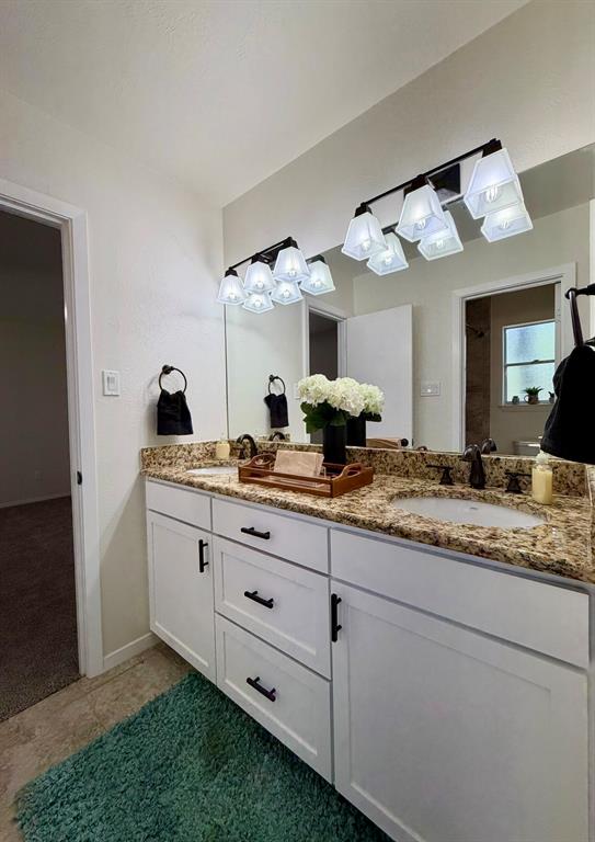 3609 Country Club Road Arlington, TX 76013 - Photo 33 of 40 a room with sink and mirror