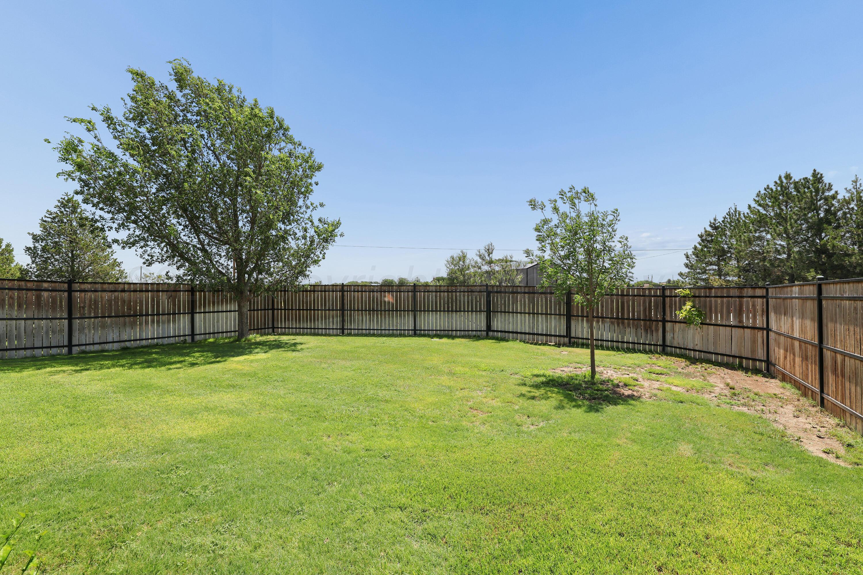 5621 White Fence Road Canyon, TX 79015 - Photo 36 of 56 36-Fenced Backyard