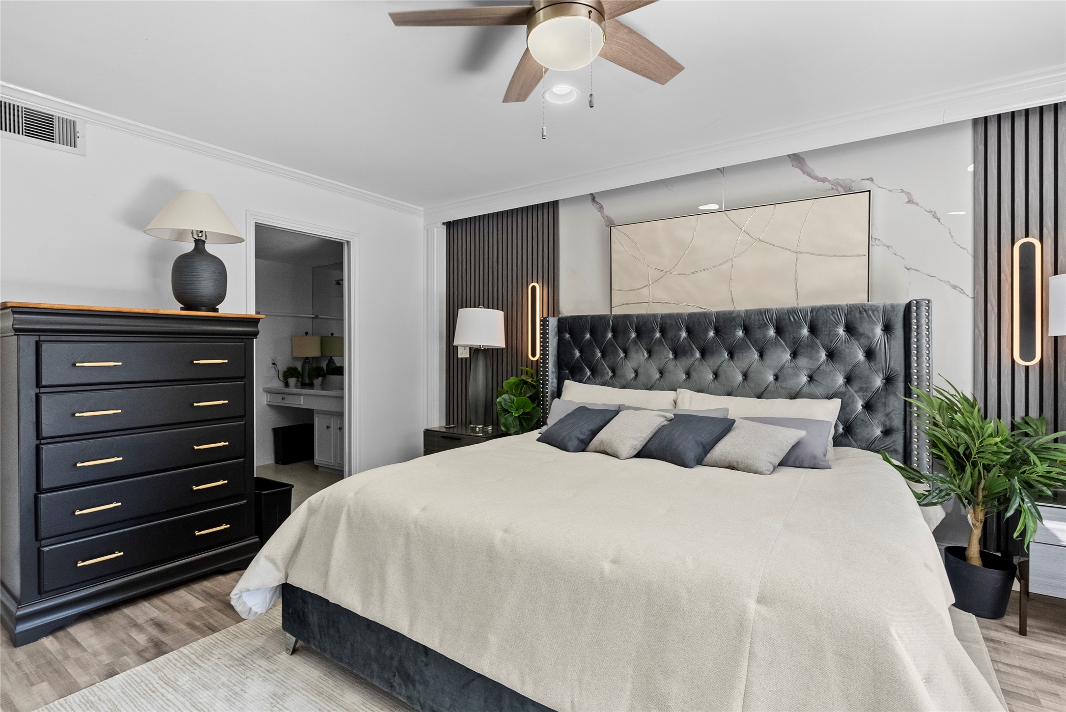 604 South Ripple Creek Drive, Unit 604 Houston, TX 77057 - Photo 17 of 31 a bedroom with a large bed and a large closet