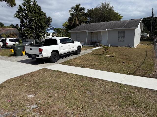 448 Perry Avenue Greenacres, FL 33463 - Photo 1 of 14 FRONT