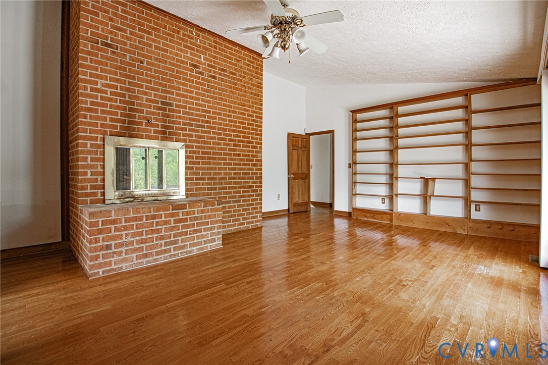 10720 Kimages Road Charles City, VA 23030 - Photo 19 of 55 a view of livingroom with furniture and wooden floor