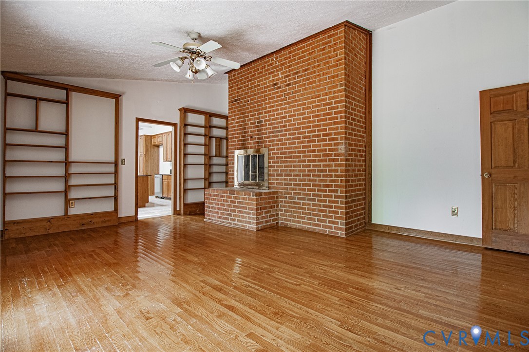 10720 Kimages Road Charles City, VA 23030 - Photo 21 of 55 wooden floor in an empty room with a window