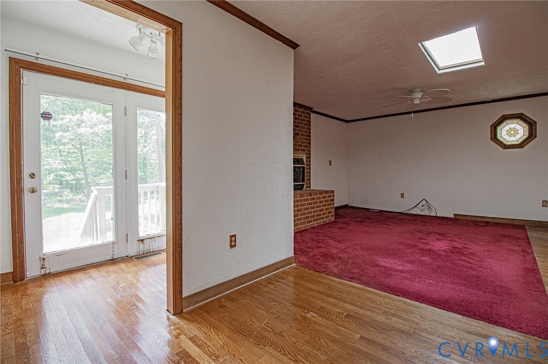 10720 Kimages Road Charles City, VA 23030 - Photo 24 of 55 a view of a room with wooden floor and window