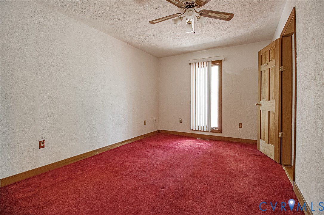 10720 Kimages Road Charles City, VA 23030 - Photo 32 of 55 a view of an empty room with a window