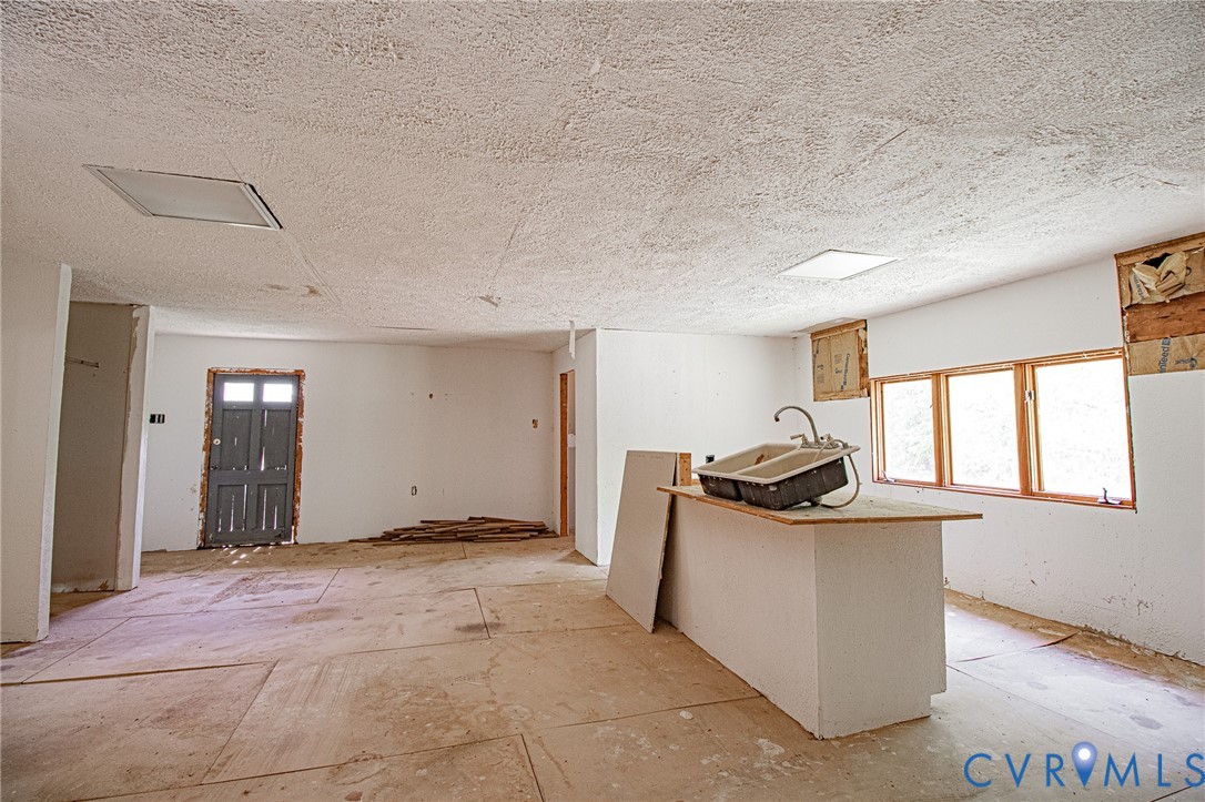 10720 Kimages Road Charles City, VA 23030 - Photo 47 of 55 a view of a kitchen with a sink dishwasher and a refrigerator