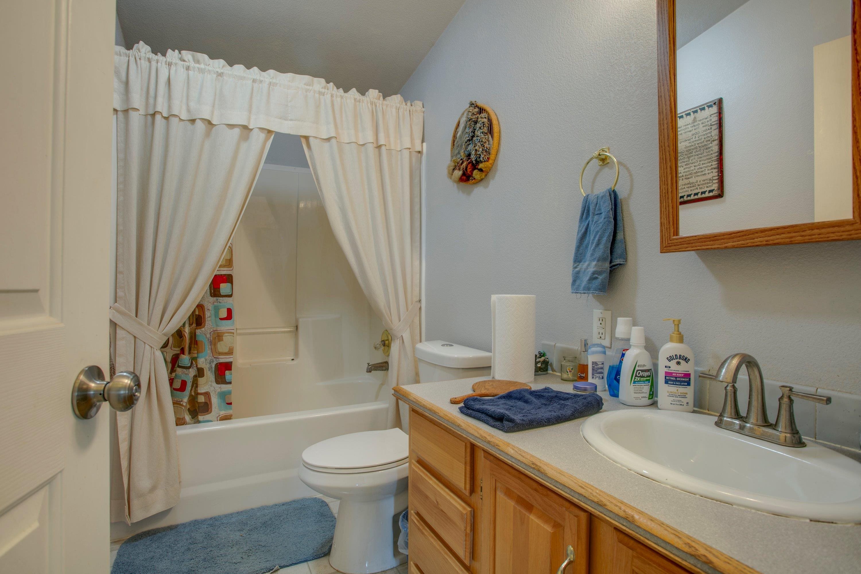 1951 I-70 B Frontage Road De Beque, CO 81630 - Photo 16 of 19 a bathroom with a sink toilet and shower