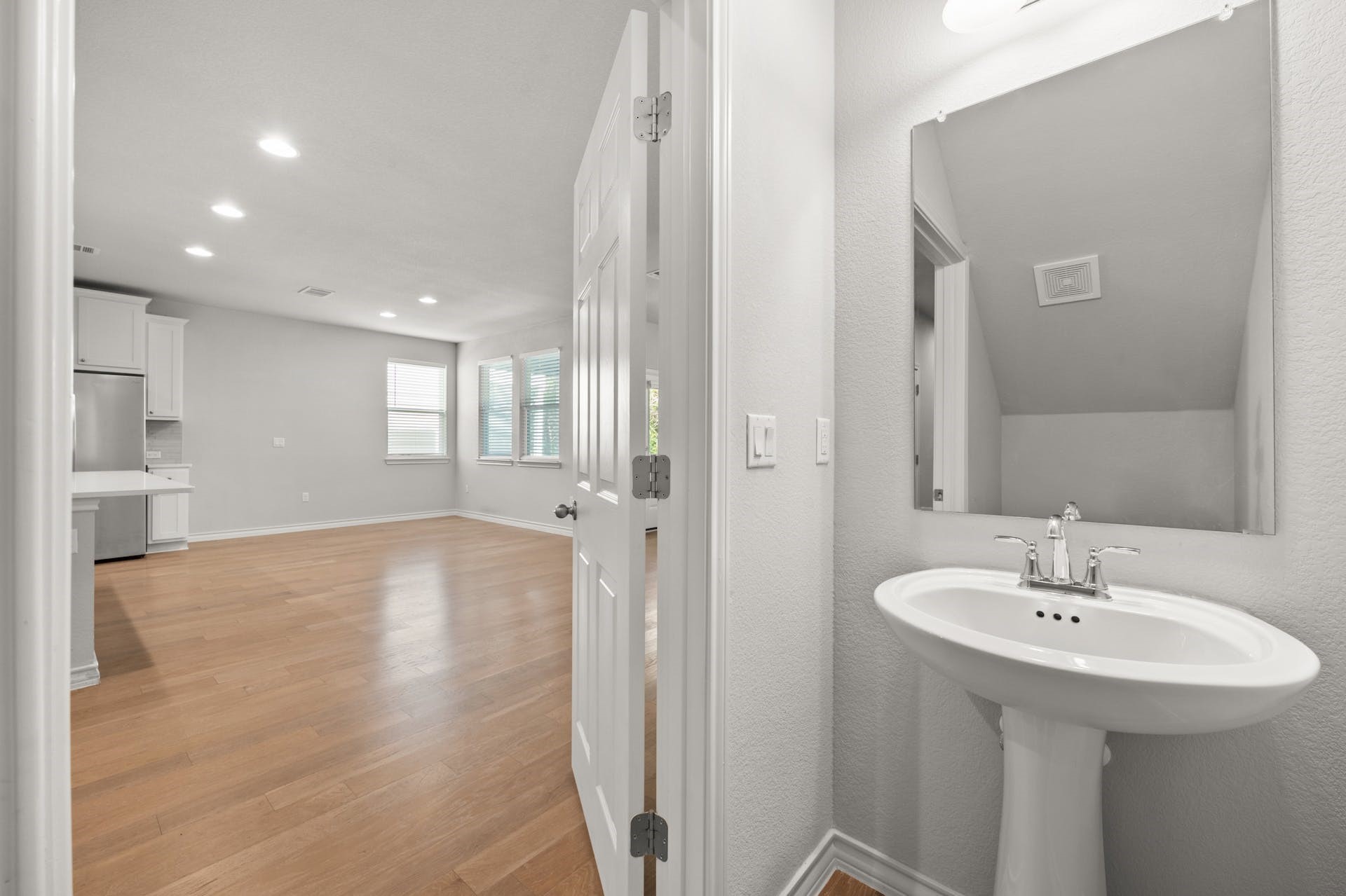 5107 Lemon Tree Path, Unit 127 Austin, TX 78723 - Photo 15 of 40 a bathroom with a sink and a mirror