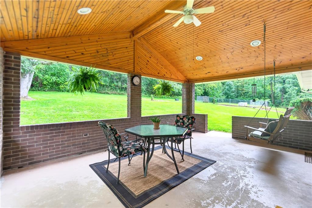 224 Bowman Road Bridgeville, PA 15017 - Photo 16 of 50 WOWZA!!!!!!! Look at this HUGE covered back patio!!!! You'll spend your days relaxing with coffee or a cocktail back here watching the deer play!