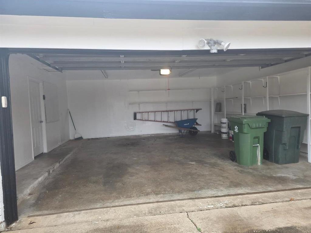 Undisclosed Address Hurst, TX 76054 - Photo 28 of 29 LOTS OF SHELVES FOR "STUFF" PLUS GARAGE DOOR OPENER