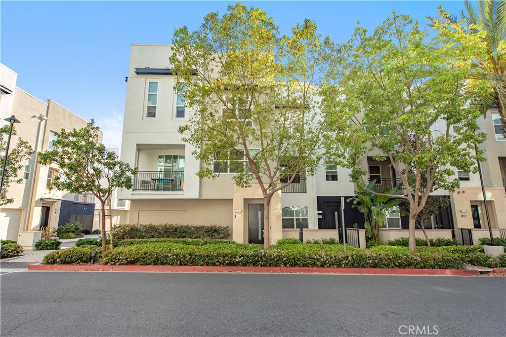 2208 Synergy Irvine, CA 92614 - Photo 22 of 22 front view of a house with a garden
