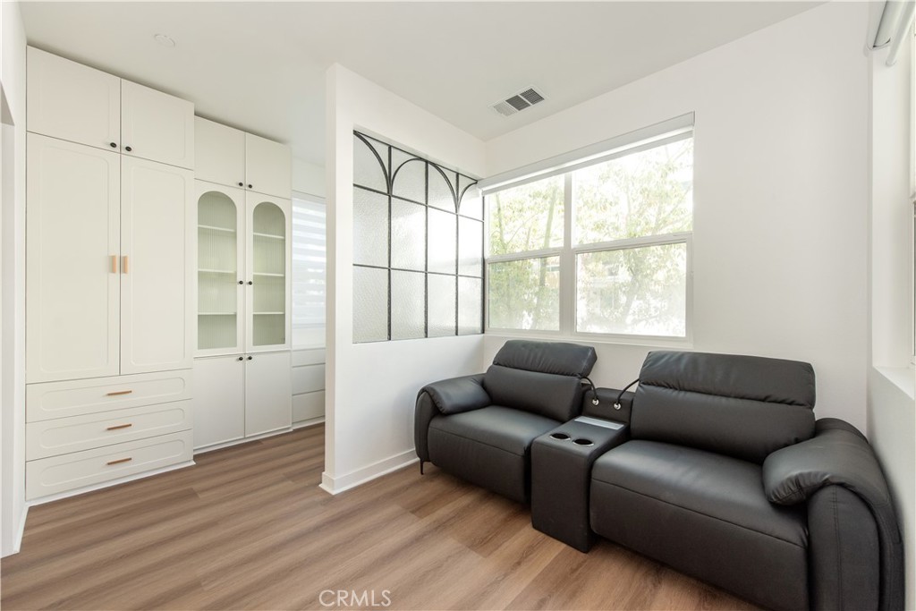 2208 Synergy Irvine, CA 92614 - Photo 3 of 22 a living room with furniture and windows