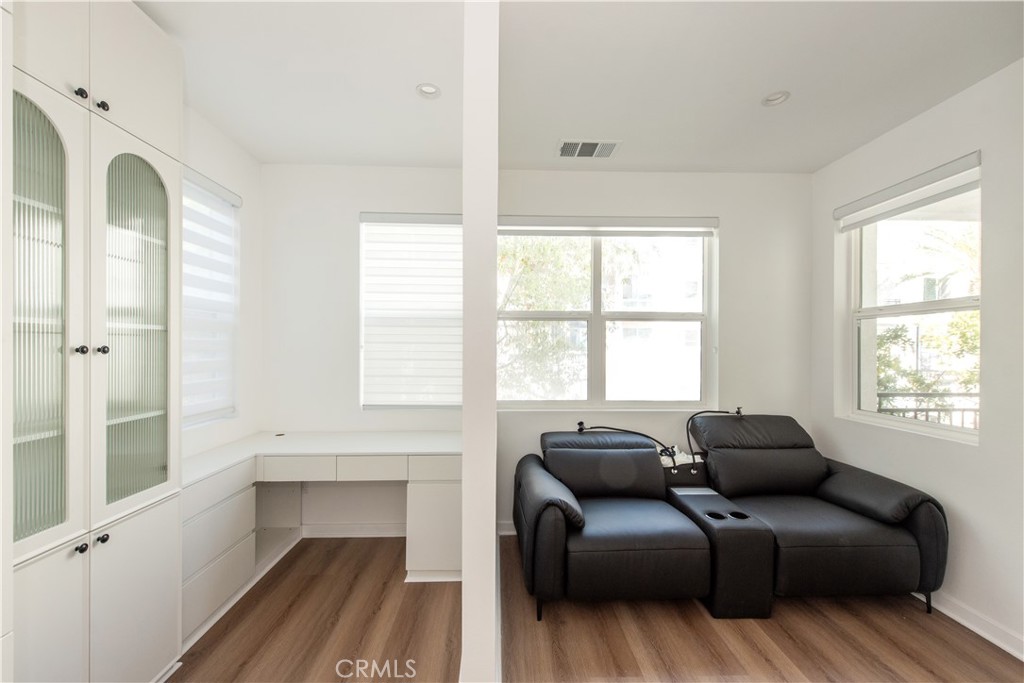 2208 Synergy Irvine, CA 92614 - Photo 4 of 22 a living room with furniture and a window
