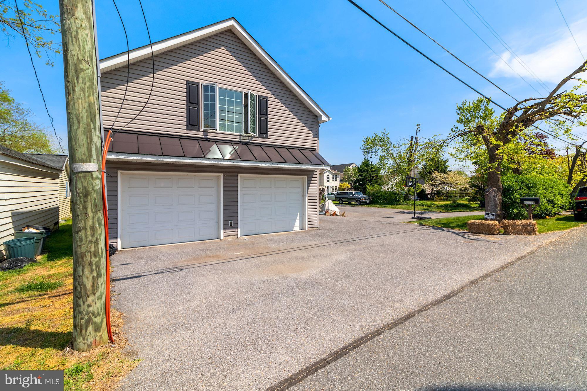 11116 Bird River Grove Road White Marsh, MD 21162 - Photo 37 of 47 Parking in Front of Garage