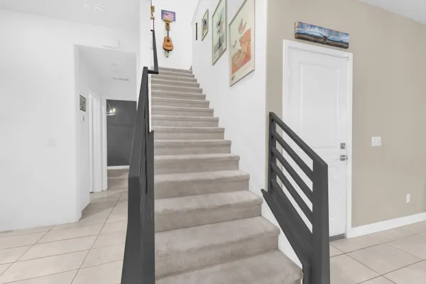 a view of entryway and kitchen