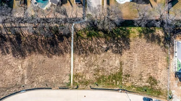a view of swimming pool with a yard