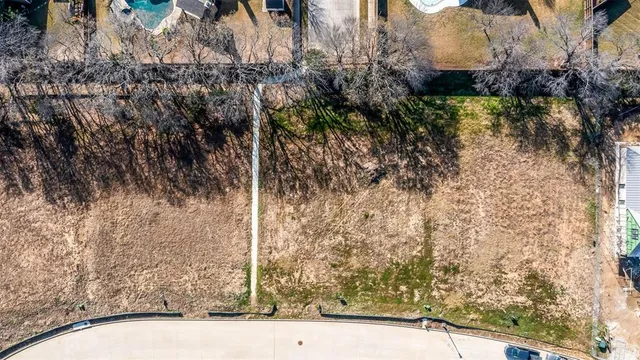 a view of swimming pool with a yard