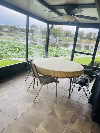 a outdoor dining space with furniture and a garden