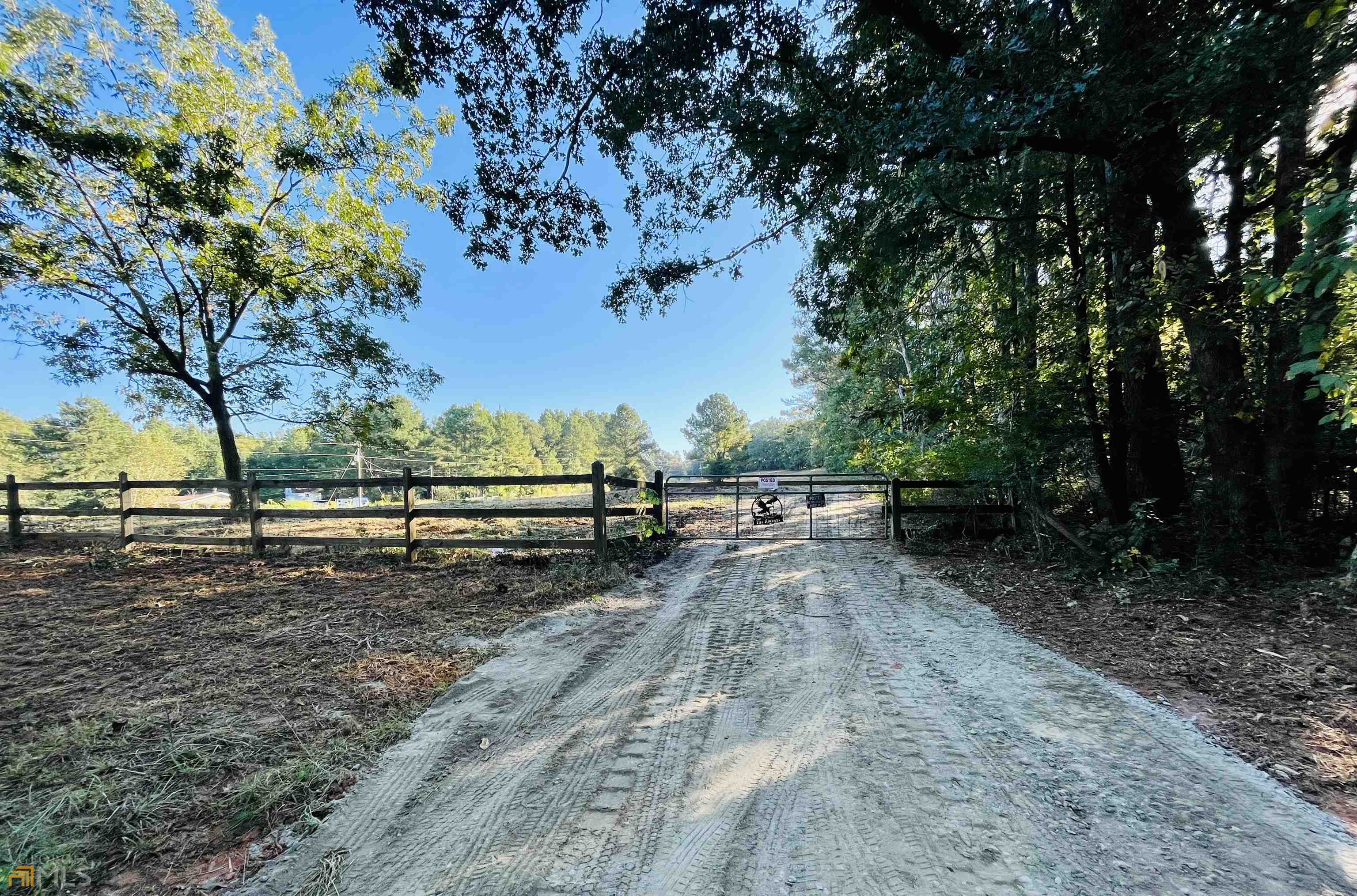 1179 McDonald Road Covington, GA 30014 - Photo 1 of 1 a view of a yard with wooden fence
