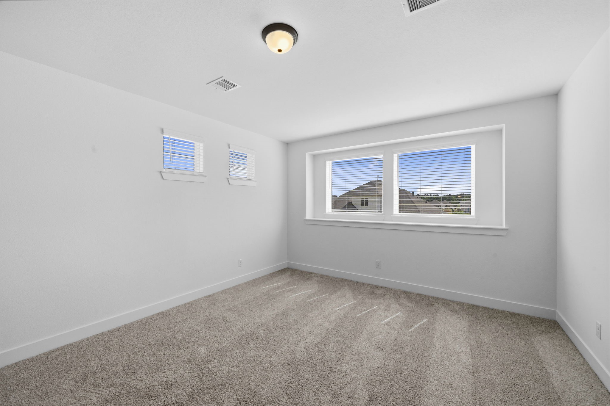 18103 Scarlett Hummingbird Court Conroe, TX 77302 - Photo 20 of 43 a view of room with window