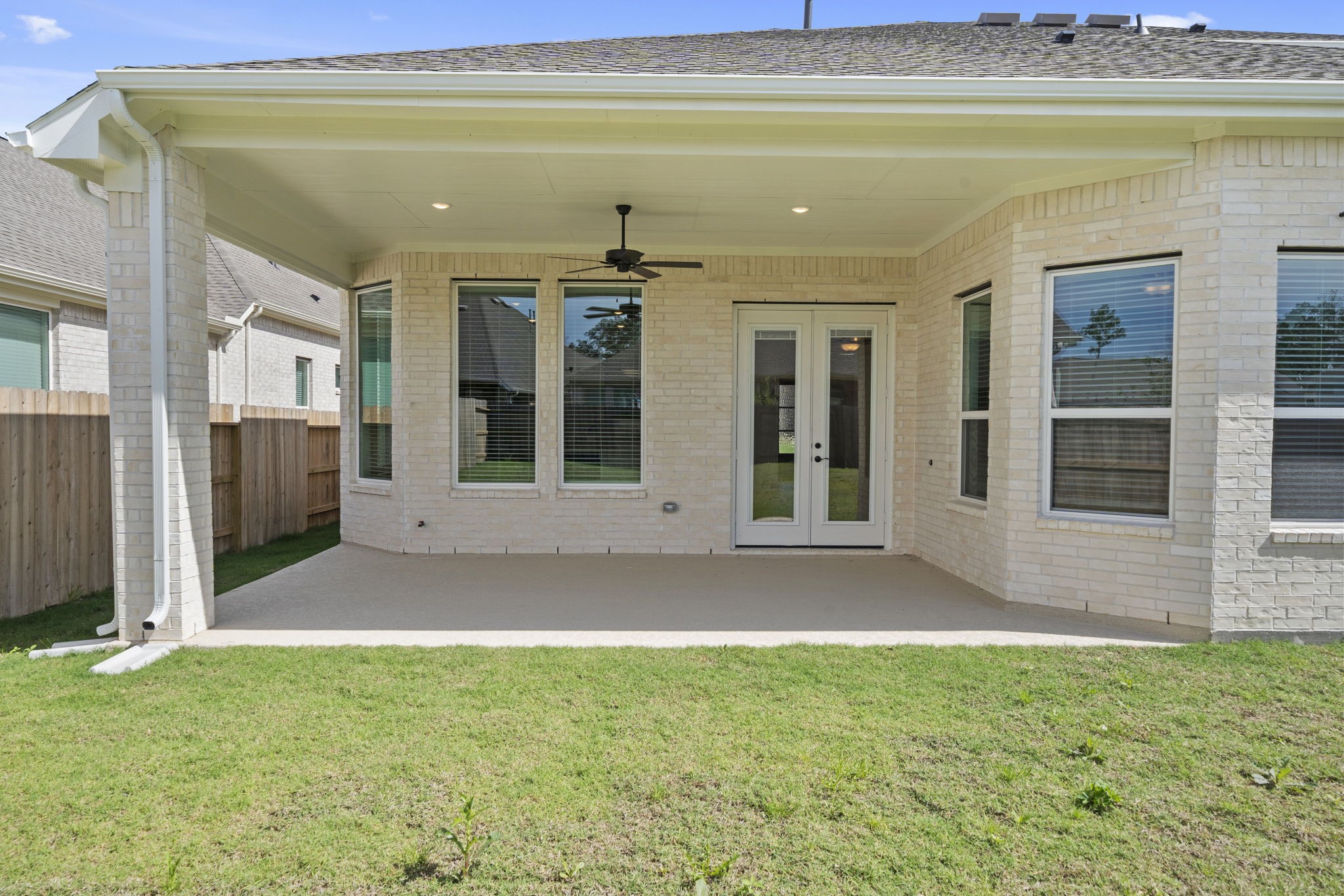 18103 Scarlett Hummingbird Court Conroe, TX 77302 - Photo 24 of 43 a view of a house with a backyard