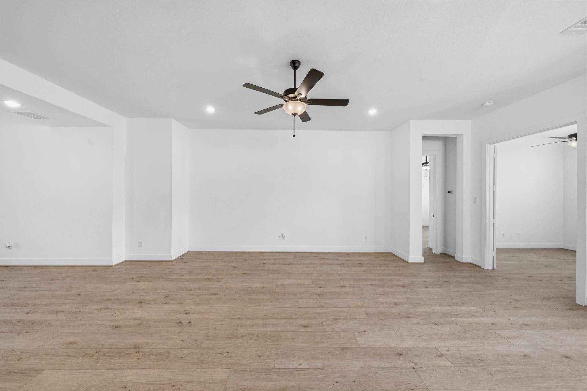 18103 Scarlett Hummingbird Court Conroe, TX 77302 - Photo 8 of 43 a view of an empty room