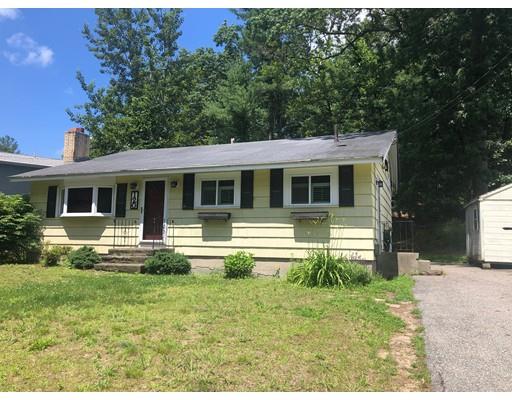 120 Meadowbrook Road Chelmsford, MA 01863 - Photo 1 of 10 a front view of a house with a yard