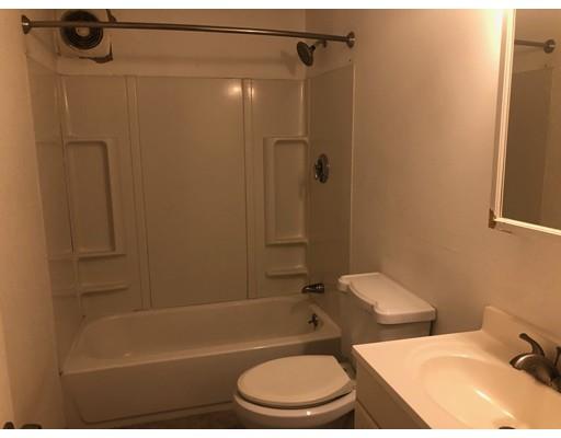 120 Meadowbrook Road Chelmsford, MA 01863 - Photo 7 of 10 a bathroom with a sink toilet and shower