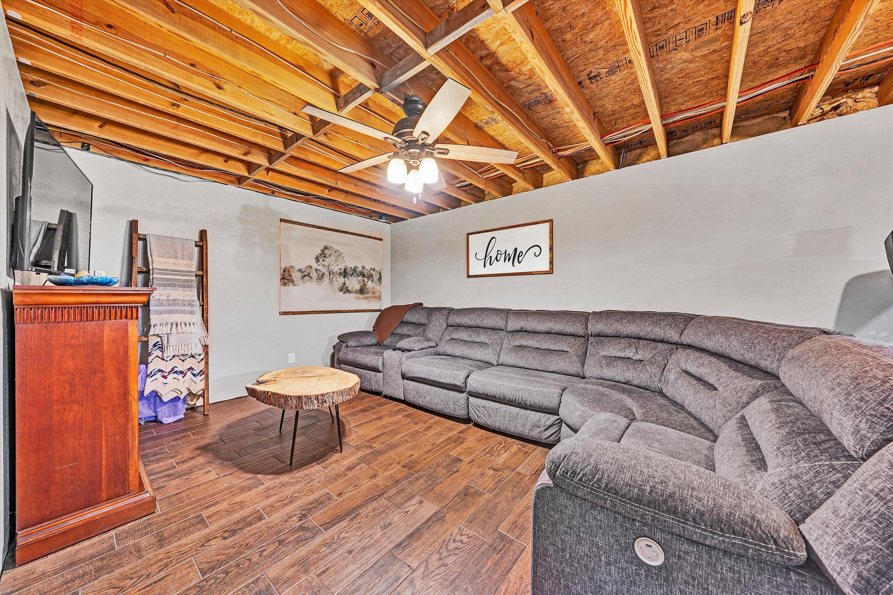 99 Spruce Lane Callaway, VA 24067 - Photo 15 of 19 a living room with furniture and a wooden floor