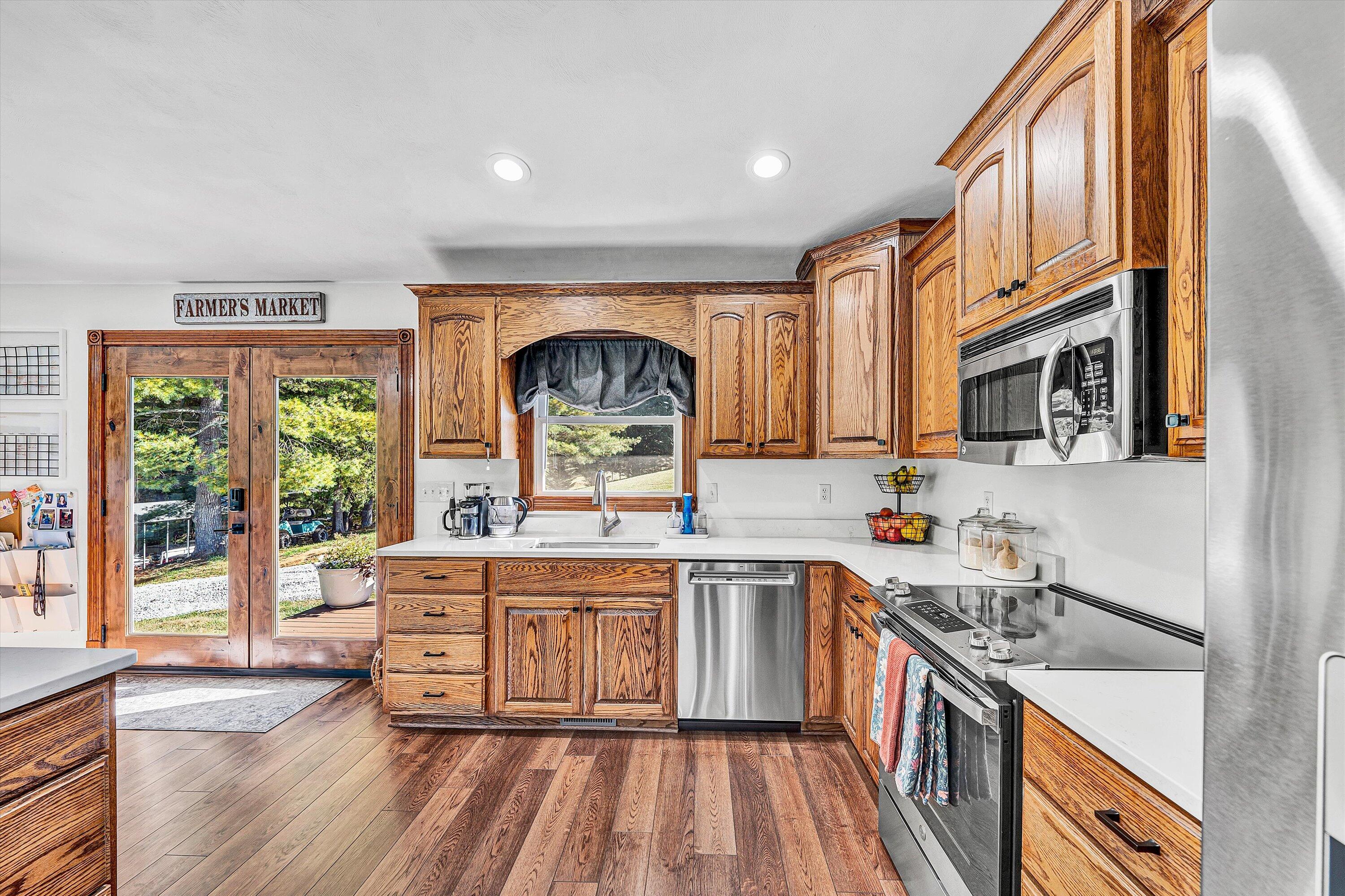 99 Spruce Lane Callaway, VA 24067 - Photo 4 of 19 a kitchen with a sink stove and cabinets