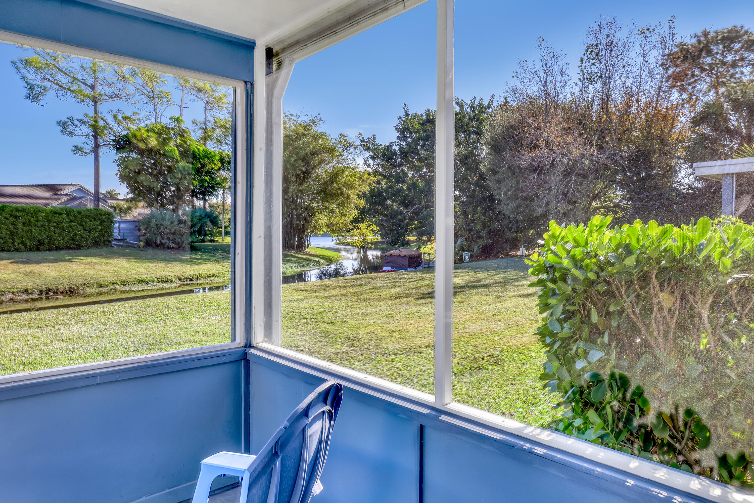 13116 Quiet Woods Road, Unit A Wellington, FL 33414 - Photo 28 of 31 a view of a garden from a window
