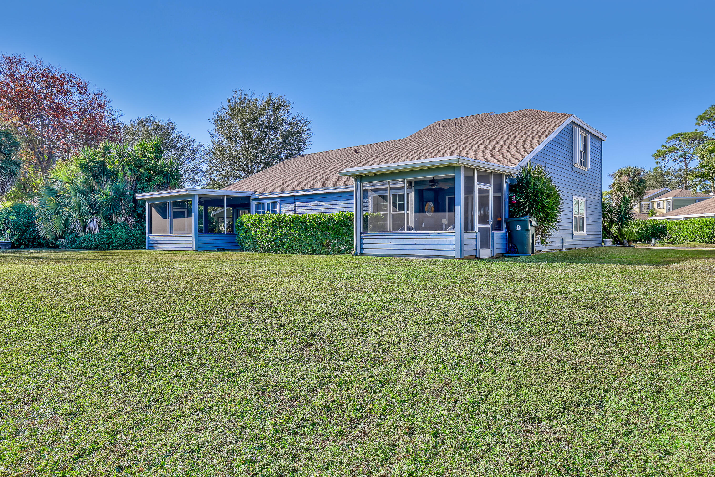 13116 Quiet Woods Road, Unit A Wellington, FL 33414 - Photo 29 of 31 a front view of house with yard and green space