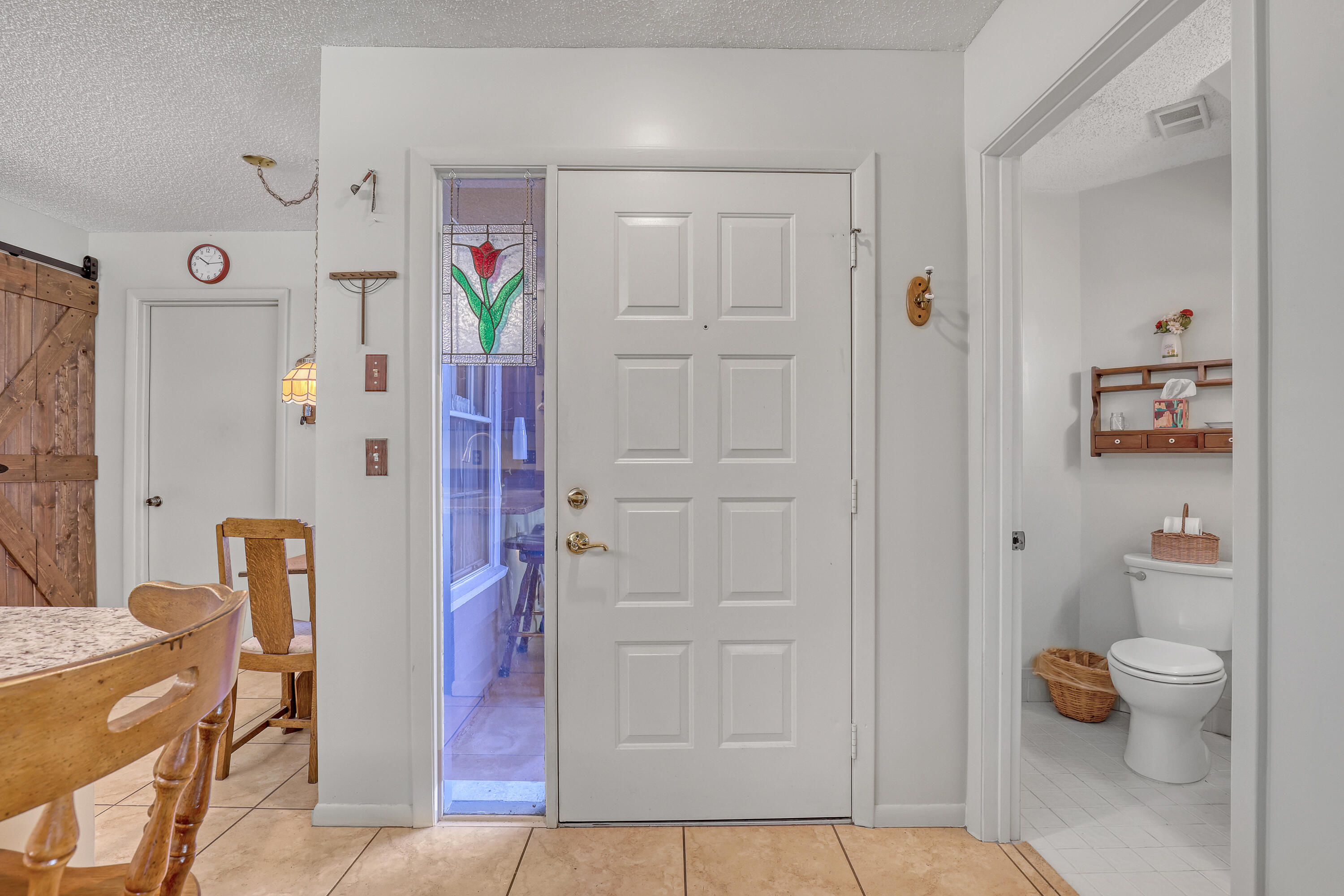 13116 Quiet Woods Road, Unit A Wellington, FL 33414 - Photo 4 of 31 a bathroom with a sink a toilet and shower