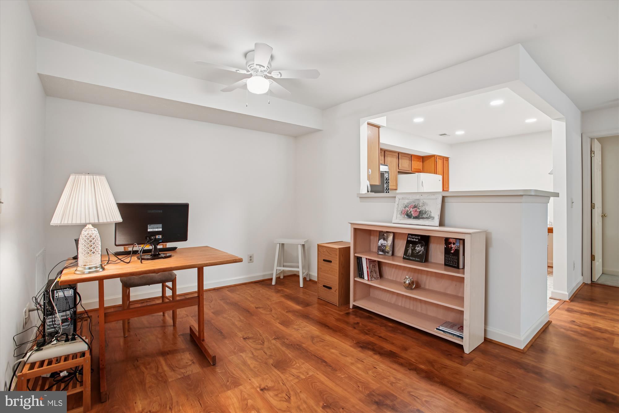 3800 Ridge Knoll Court, Unit 2 Fairfax, VA 22033 - Photo 11 of 50 a view of a workspace with furniture and wooden floor