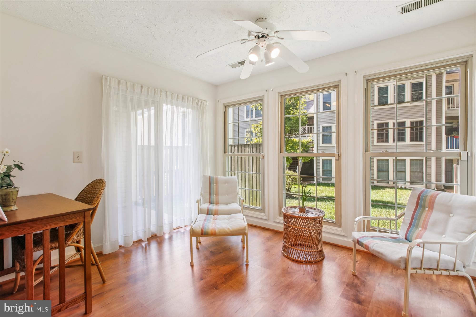 3800 Ridge Knoll Court, Unit 2 Fairfax, VA 22033 - Photo 13 of 50 a living room with furniture and wooden floor