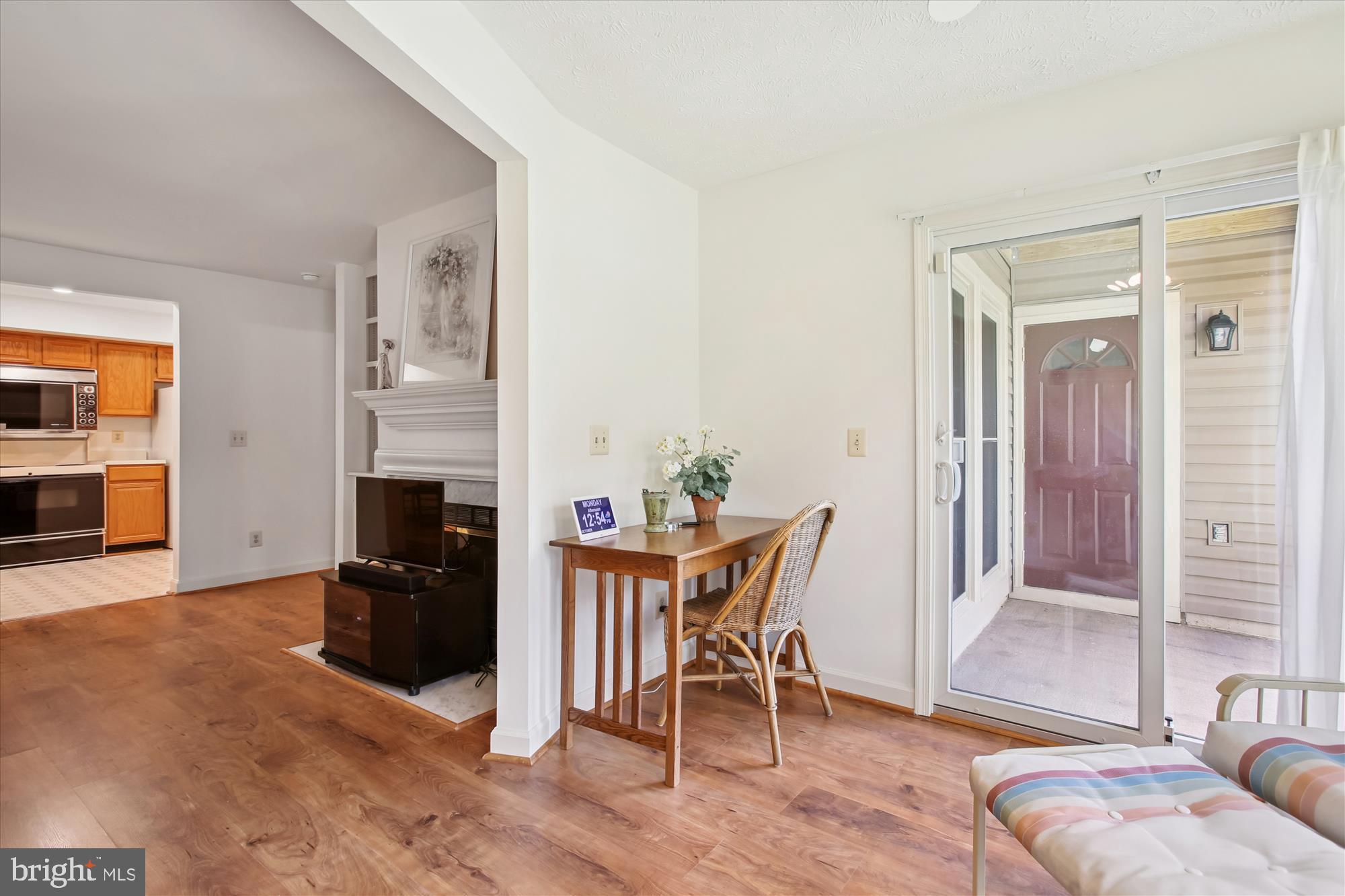 3800 Ridge Knoll Court, Unit 2 Fairfax, VA 22033 - Photo 15 of 50 a living room with furniture and a fireplace
