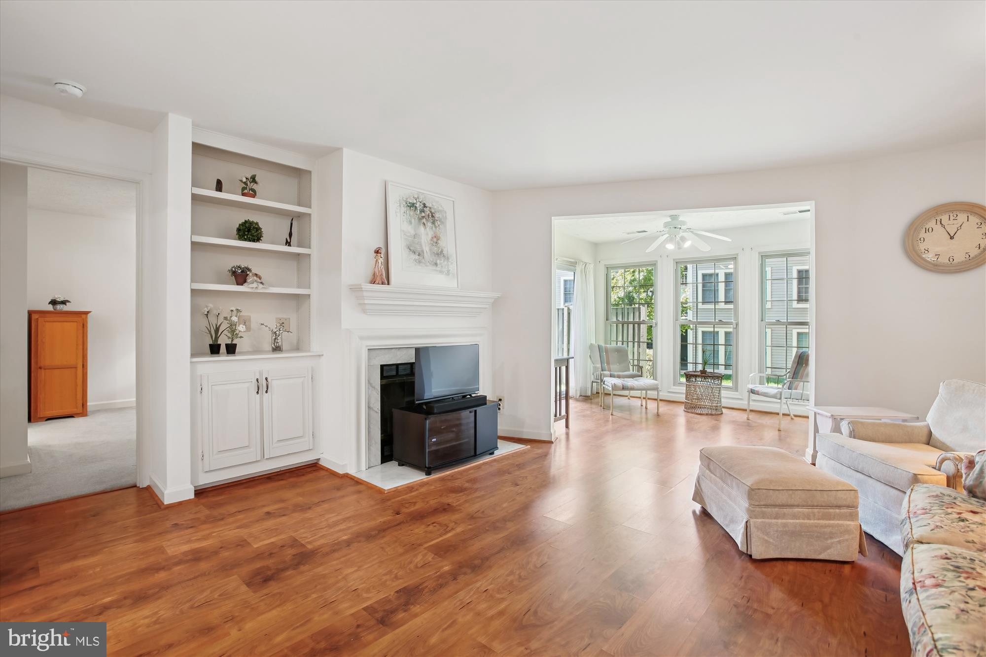 3800 Ridge Knoll Court, Unit 2 Fairfax, VA 22033 - Photo 2 of 50 a living room with furniture and a fireplace