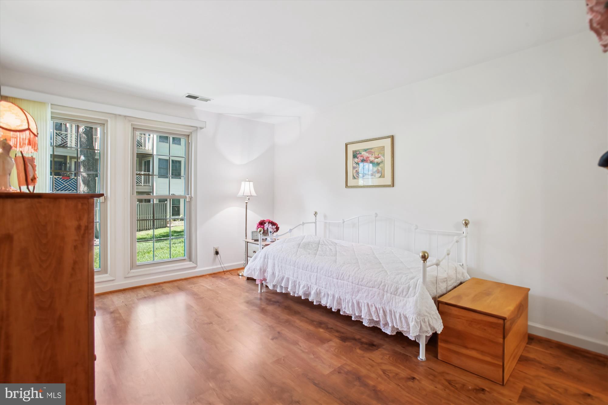 3800 Ridge Knoll Court, Unit 2 Fairfax, VA 22033 - Photo 22 of 50 a bed sitting in a bedroom next to a window
