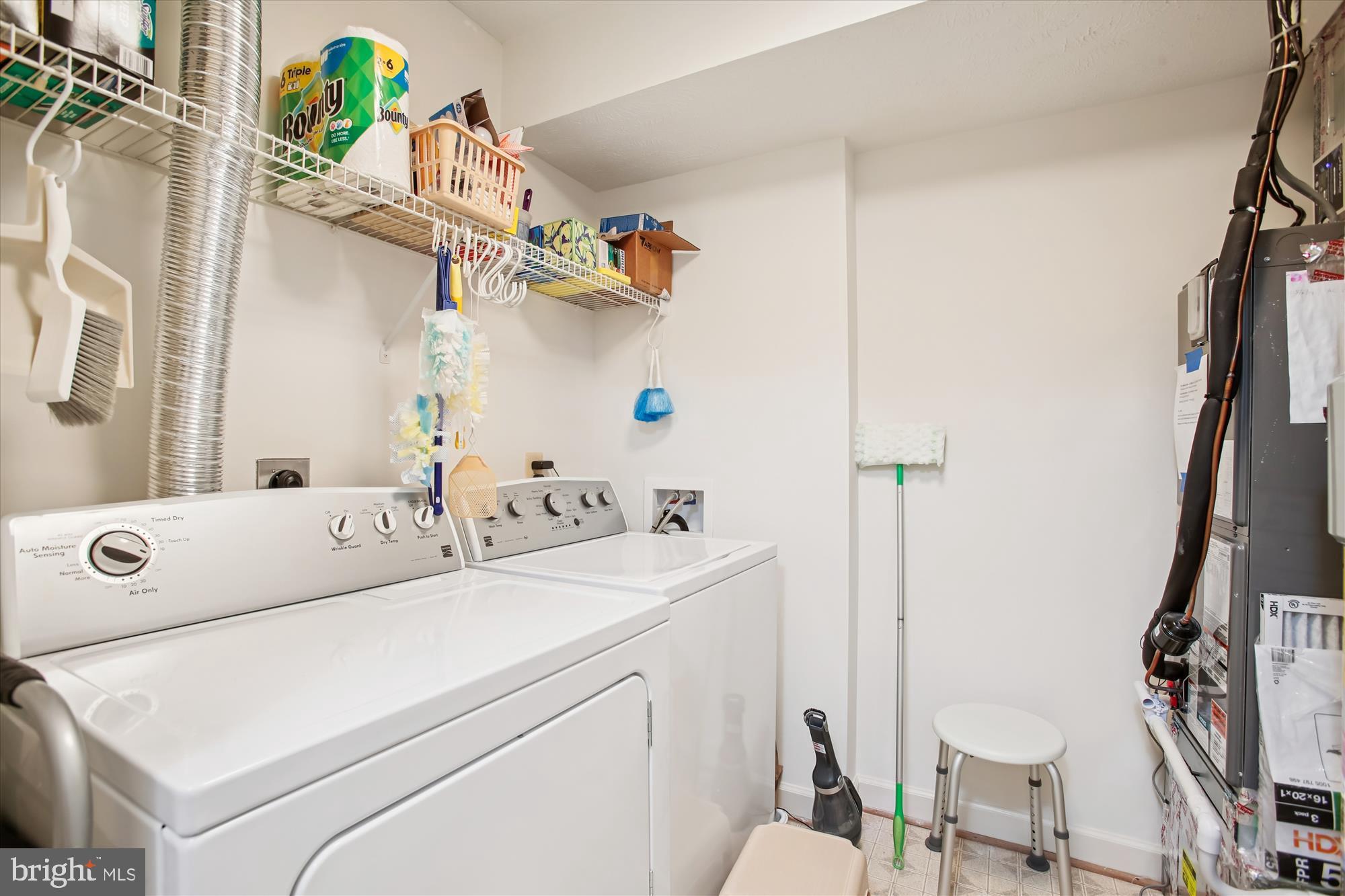 3800 Ridge Knoll Court, Unit 2 Fairfax, VA 22033 - Photo 27 of 50 a bathroom with a sink a toilet and a shower curtain