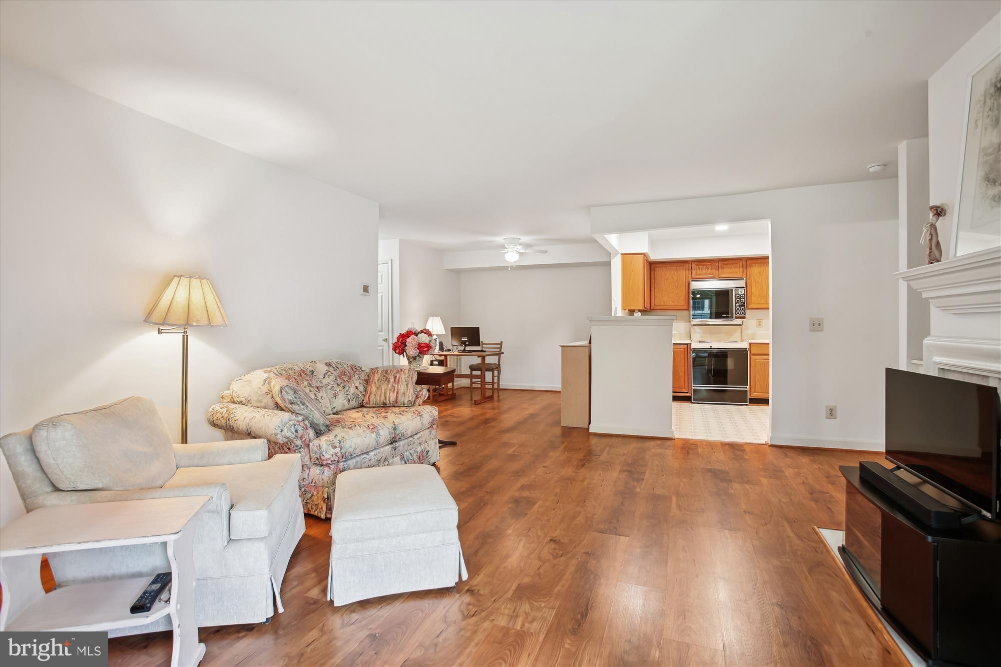 3800 Ridge Knoll Court, Unit 2 Fairfax, VA 22033 - Photo 49 of 50 a living room with furniture and a flat screen tv