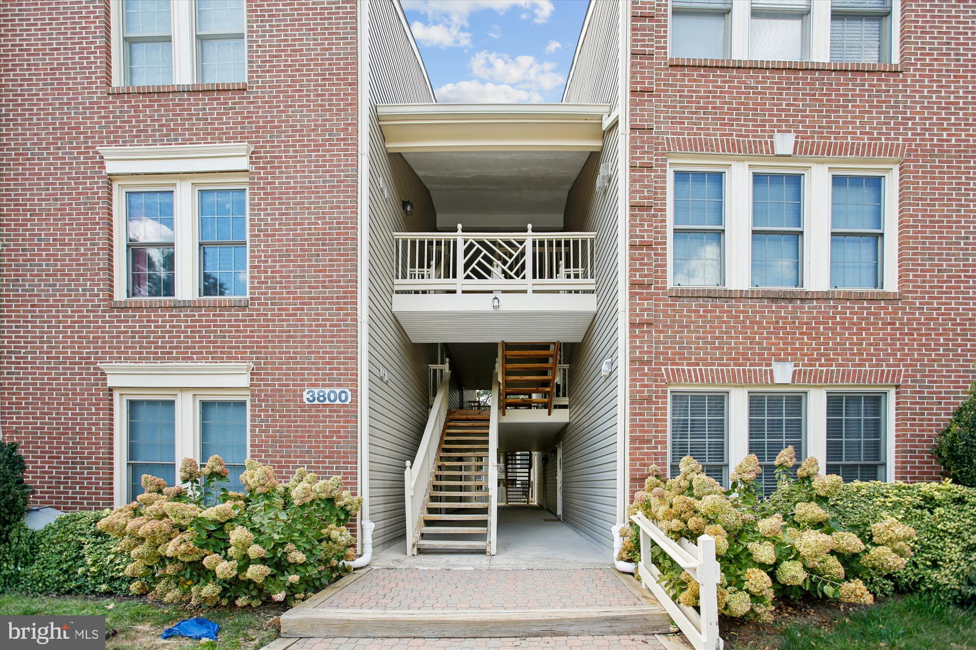 3800 Ridge Knoll Court, Unit 2 Fairfax, VA 22033 - Photo 32 of 50 front view of a brick house with a large window