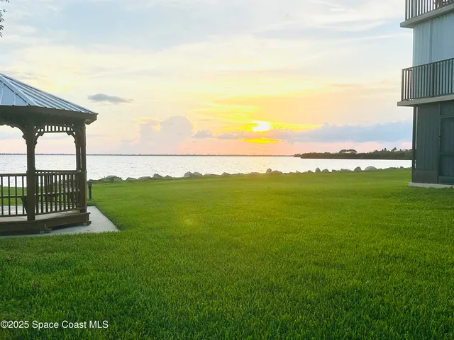 a view of a garden from a balcony