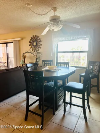 a dining room with a table chairs and a dining table