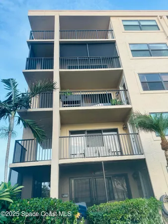 a view of balcony with book outdoor seating